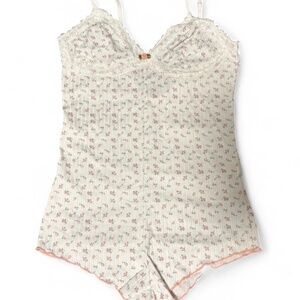 floral romper with pink trim